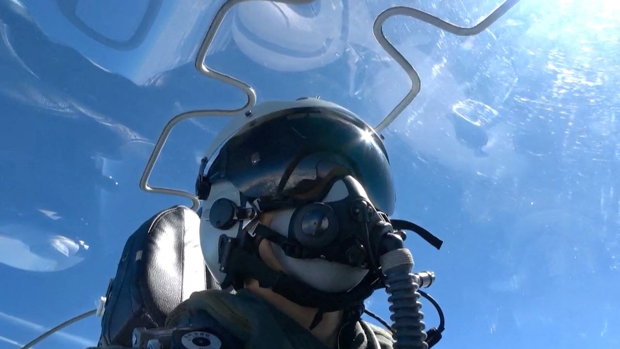 A member of Chinese People's Liberation Army (PLA) sits in an aircraft during the "Joint Sword-2024B" military drills around Taiwan, from an undisclosed location in this screenshot from a handout video released by the PLA Eastern Theatre Command on October 14, 2024. PLA Eastern Theatre Command/Handout via REUTERS  ATTENTION EDITORS - THIS IMAGE WAS PROVIDED BY A THIRD PARTY. MANDATORY CREDIT. NO RESALES. NO ARCHIVES.    