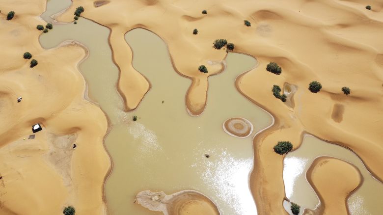 A view of lakes caused by heavy rainfall between sand dunes in the desert town of Merzouga, near Rachidia, southeastern Morocco, Wednesday, Oct. 2, 2024. (AP Photo)