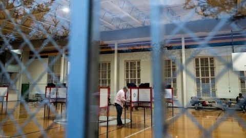 Voters attend to cast their ballots at the Highland Middle School on November 7, 2023 in Louisville, Kentucky. 